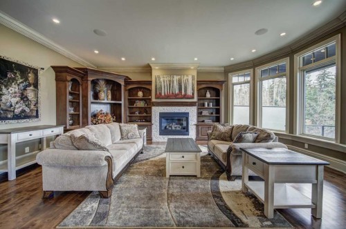 2626 Evercreek Bluffs Way Sw, Calgary, AB - Indoor Photo Showing Living Room With Fireplace