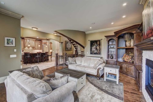 2626 Evercreek Bluffs Way Sw, Calgary, AB - Indoor Photo Showing Living Room With Fireplace