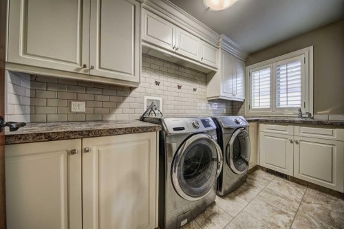 2626 Evercreek Bluffs Way Sw, Calgary, AB - Indoor Photo Showing Laundry Room