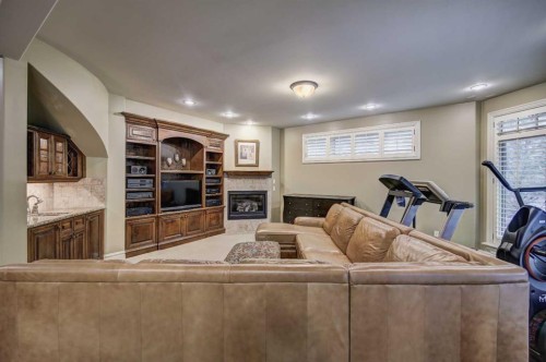 2626 Evercreek Bluffs Way Sw, Calgary, AB - Indoor With Fireplace
