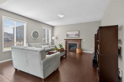 333 Viewpointe Terrace, Chestermere, AB - Indoor Photo Showing Living Room With Fireplace