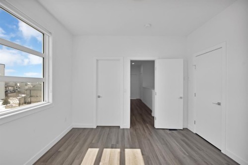 105-101 Panatella Square Nw, Calgary, AB - Indoor Photo Showing Other Room