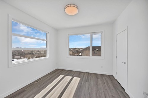 105-101 Panatella Square Nw, Calgary, AB - Indoor Photo Showing Other Room
