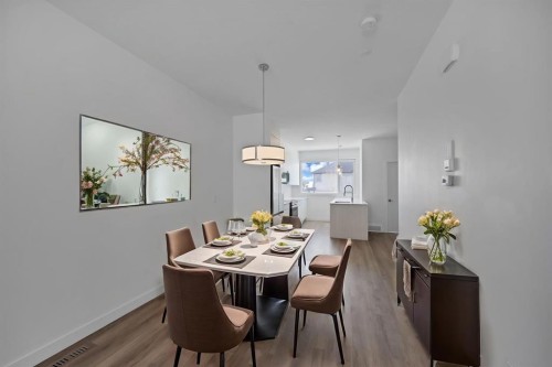 105-101 Panatella Square Nw, Calgary, AB - Indoor Photo Showing Dining Room
