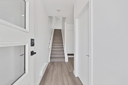 105-101 Panatella Square Nw, Calgary, AB - Indoor Photo Showing Other Room