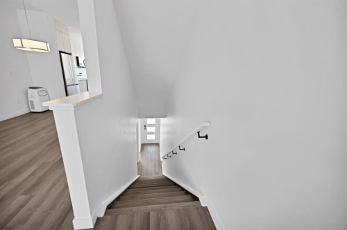 105-101 Panatella Square Nw, Calgary, AB - Indoor Photo Showing Other Room