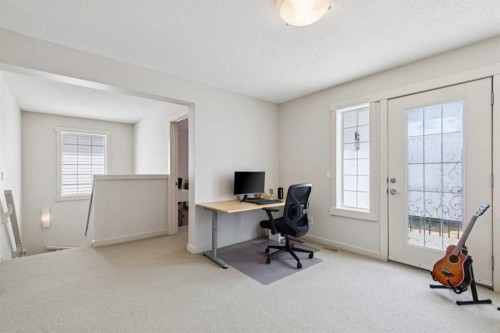 27 Elgin Terrace Se, Calgary, AB - Indoor Photo Showing Bedroom