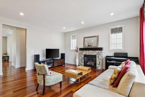 27 Elgin Terrace Se, Calgary, AB - Indoor Photo Showing Living Room With Fireplace