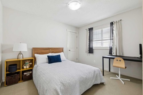 27 Elgin Terrace Se, Calgary, AB - Indoor Photo Showing Bedroom