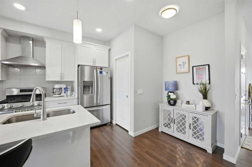 186 Carringvue Park Nw, Calgary, AB - Indoor Photo Showing Kitchen With Double Sink With Upgraded Kitchen