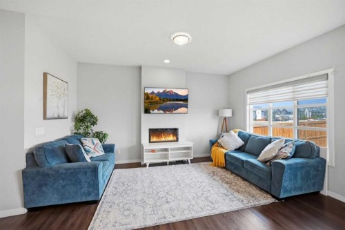 186 Carringvue Park Nw, Calgary, AB - Indoor Photo Showing Living Room With Fireplace