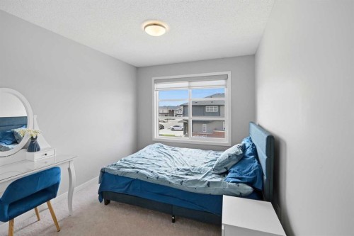 186 Carringvue Park Nw, Calgary, AB - Indoor Photo Showing Bedroom