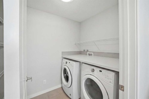 186 Carringvue Park Nw, Calgary, AB - Indoor Photo Showing Laundry Room
