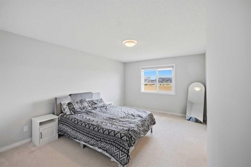 186 Carringvue Park Nw, Calgary, AB - Indoor Photo Showing Bedroom