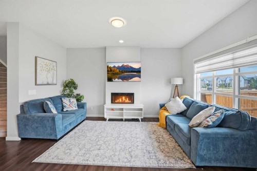186 Carringvue Park Nw, Calgary, AB - Indoor Photo Showing Living Room With Fireplace