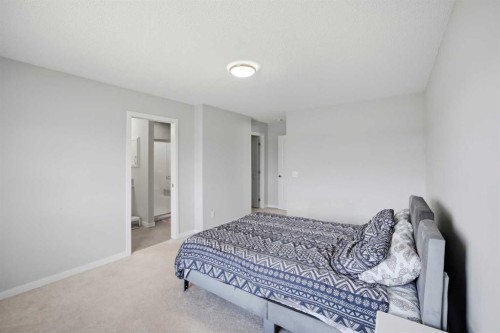 186 Carringvue Park Nw, Calgary, AB - Indoor Photo Showing Bedroom
