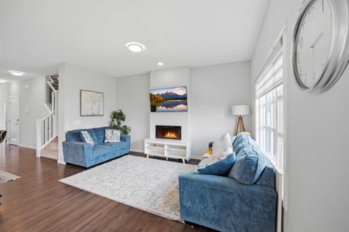 186 Carringvue Park Nw, Calgary, AB - Indoor Photo Showing Living Room With Fireplace