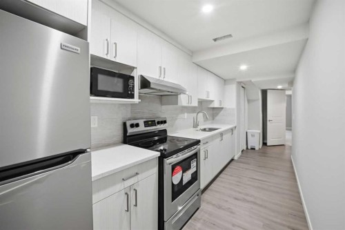 186 Carringvue Park Nw, Calgary, AB - Indoor Photo Showing Kitchen With Upgraded Kitchen