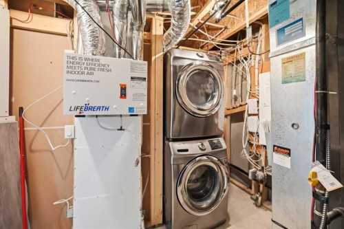 186 Carringvue Park Nw, Calgary, AB - Indoor Photo Showing Laundry Room