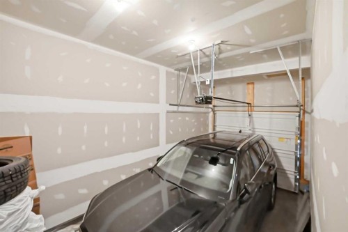186 Carringvue Park Nw, Calgary, AB - Indoor Photo Showing Garage