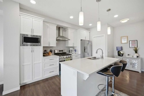 186 Carringvue Park Nw, Calgary, AB - Indoor Photo Showing Kitchen With Double Sink With Upgraded Kitchen