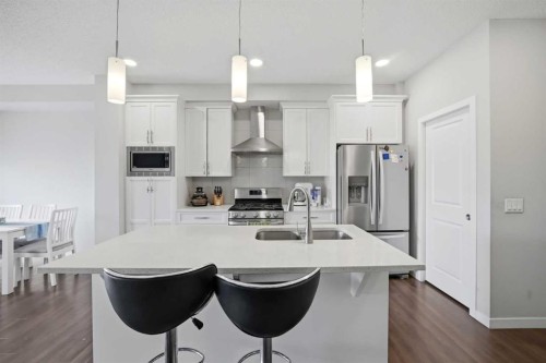 186 Carringvue Park Nw, Calgary, AB - Indoor Photo Showing Kitchen With Double Sink With Upgraded Kitchen