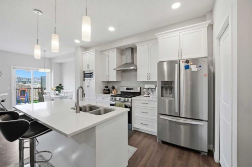 186 Carringvue Park Nw, Calgary, AB - Indoor Photo Showing Kitchen With Double Sink With Upgraded Kitchen