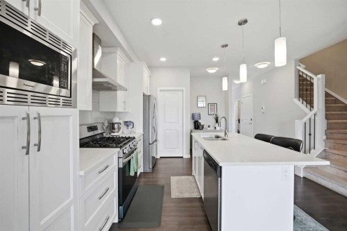 186 Carringvue Park Nw, Calgary, AB - Indoor Photo Showing Kitchen With Double Sink With Upgraded Kitchen