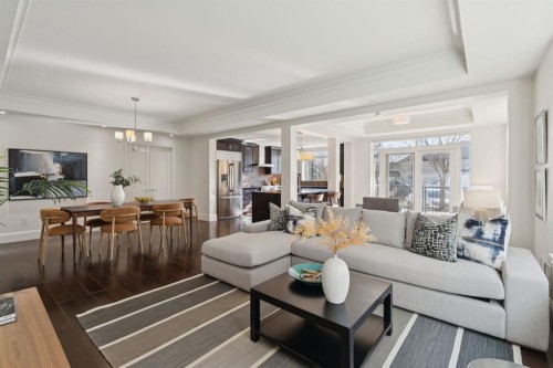 103-211 Quarry Way Se, Calgary, AB - Indoor Photo Showing Living Room