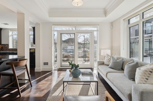 103-211 Quarry Way Se, Calgary, AB - Indoor Photo Showing Living Room