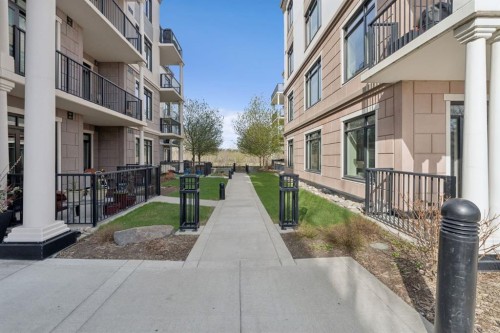 103-211 Quarry Way Se, Calgary, AB - Outdoor With Exterior