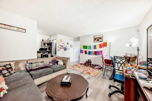 3042 Doverville Crescent Se, Calgary, AB - Indoor Photo Showing Living Room