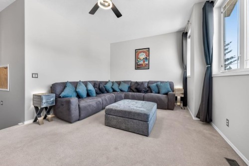 44 Bow Ridge Drive, Cochrane, AB - Indoor Photo Showing Living Room