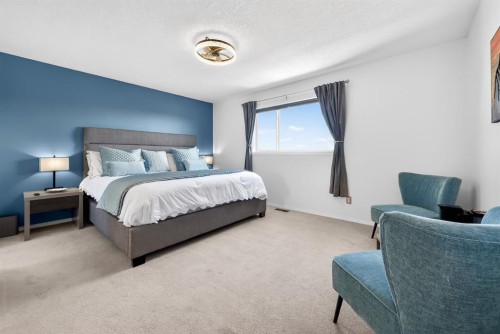 44 Bow Ridge Drive, Cochrane, AB - Indoor Photo Showing Bedroom