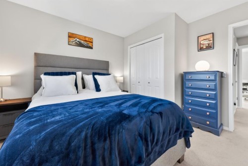 44 Bow Ridge Drive, Cochrane, AB - Indoor Photo Showing Bedroom
