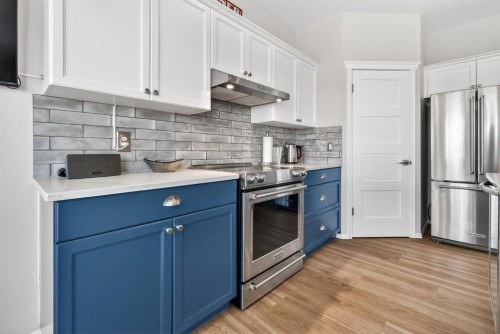 44 Bow Ridge Drive, Cochrane, AB - Indoor Photo Showing Kitchen With Stainless Steel Kitchen With Upgraded Kitchen