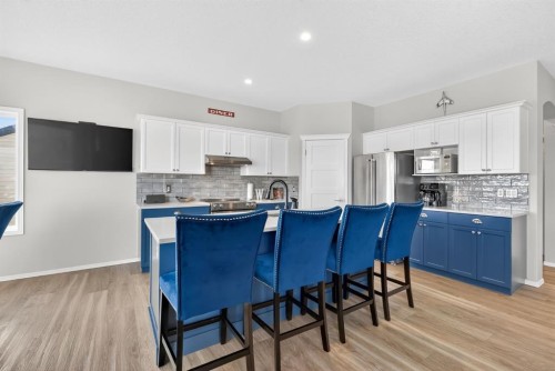 44 Bow Ridge Drive, Cochrane, AB - Indoor Photo Showing Kitchen With Stainless Steel Kitchen With Upgraded Kitchen