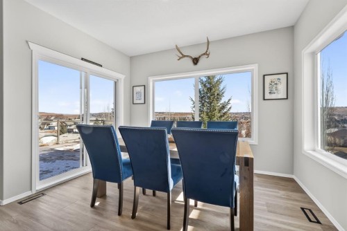 44 Bow Ridge Drive, Cochrane, AB - Indoor Photo Showing Dining Room