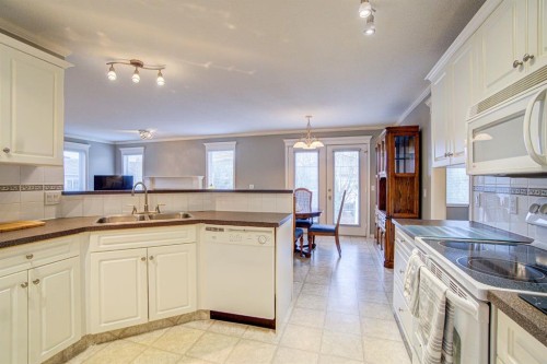 26 Skyline Crescent, Claresholm, AB - Indoor Photo Showing Kitchen With Double Sink