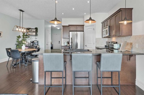 125 Monteith Drive Se, High River, AB - Indoor Photo Showing Kitchen With Upgraded Kitchen