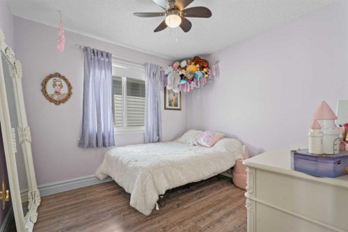 125 Monteith Drive Se, High River, AB - Indoor Photo Showing Bedroom