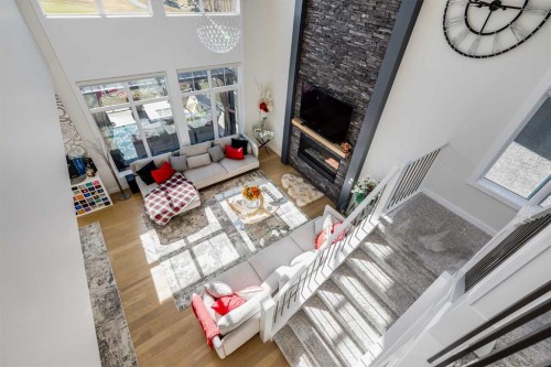 75 Muirfield Close, Lyalta, AB - Indoor With Fireplace