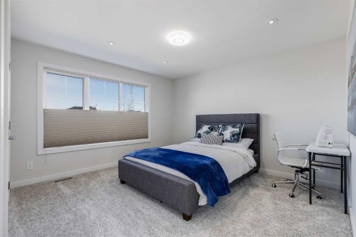75 Muirfield Close, Lyalta, AB - Indoor Photo Showing Bedroom