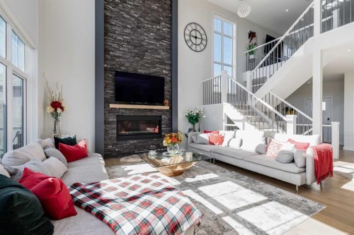 75 Muirfield Close, Lyalta, AB - Indoor Photo Showing Living Room With Fireplace