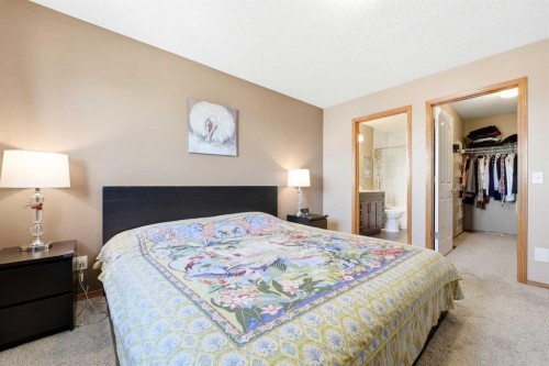 129 Arbour Ridge Circle Nw, Calgary, AB - Indoor Photo Showing Bedroom
