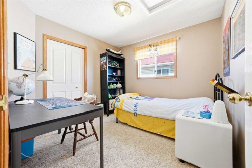 129 Arbour Ridge Circle Nw, Calgary, AB - Indoor Photo Showing Bedroom