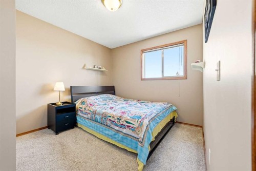 129 Arbour Ridge Circle Nw, Calgary, AB - Indoor Photo Showing Bedroom
