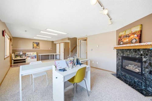 129 Arbour Ridge Circle Nw, Calgary, AB - Indoor With Fireplace