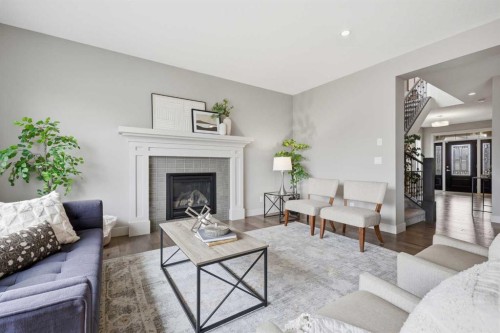 86 Panton View Nw, Calgary, AB - Indoor Photo Showing Living Room With Fireplace