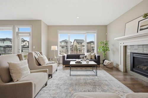 86 Panton View Nw, Calgary, AB - Indoor Photo Showing Living Room With Fireplace